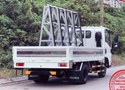 ISUZU QLR77FE4 CHỞ KÍNH